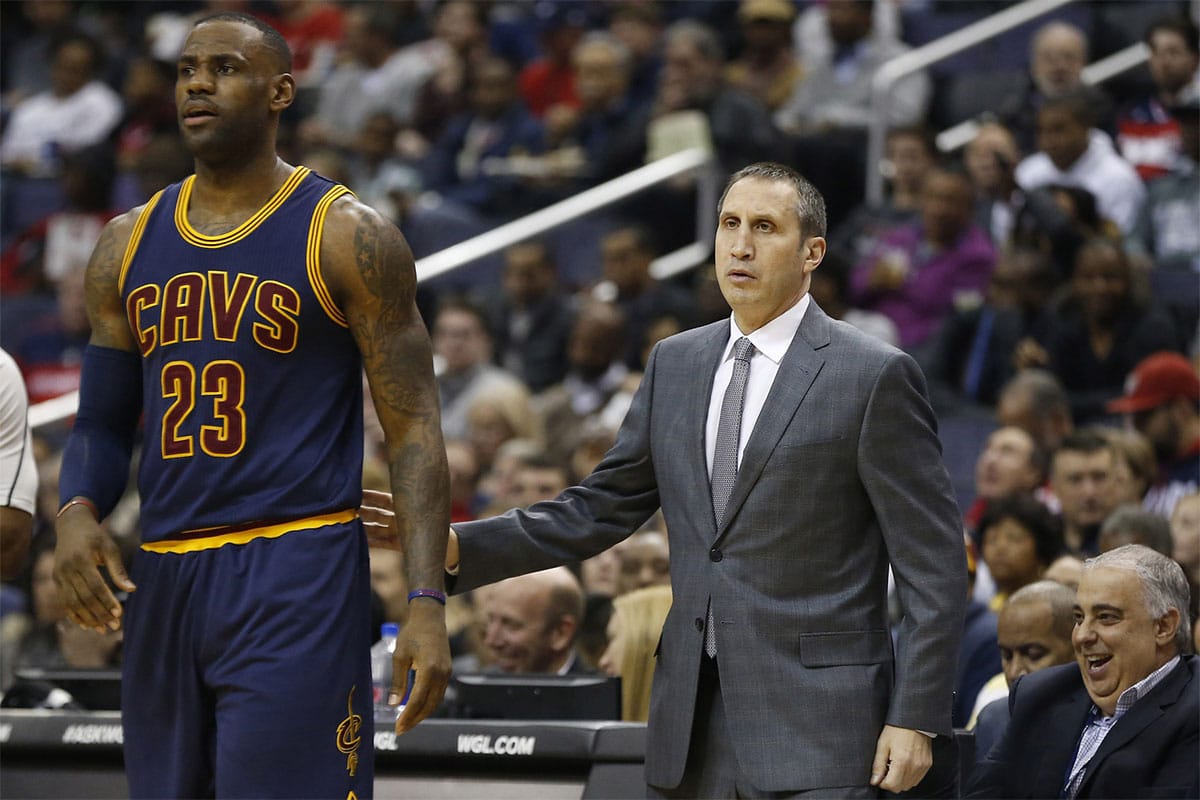 Cleveland Cavaliers forward LeBron James (23) stands with Cavaliers head coach David Blatt (R) against the Washington Wizards in the second quarter at Verizon Center. The Cavaliers won 121-115. 