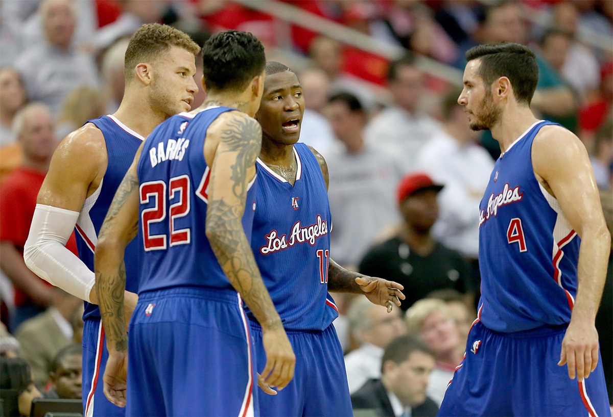 Los Angeles Clippers guard Jamal Crawford (11) talks with forward Blake Griffin (32), forward Matt Barnes (22) and guard J.J. Redick (4) during a Houston Rockets timeout in game one of the second round of the NBA Playoffs at Toyota Center. Los Angeles Clippers won 117 to 101.