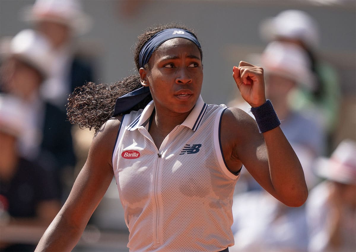 Coco Gauff of the United States reacts to a point during her match against Iga Swiatek of Poland on day 12 of Roland Garros.
