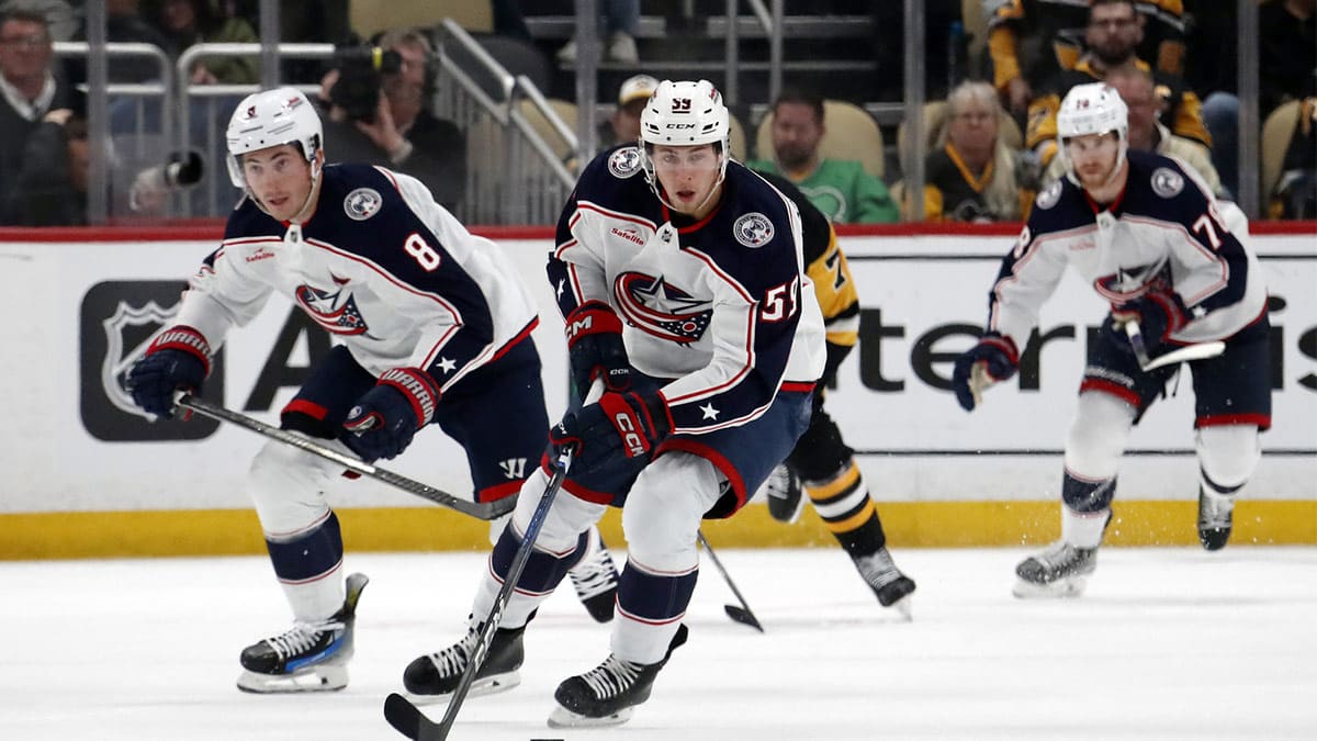 Columbus Blue Jackets right wing Yegor Chinakhov (59) leads a breakout up ice against the Pittsburgh Penguins during the second period at PPG Paints Arena. The Penguins won 5-3.
