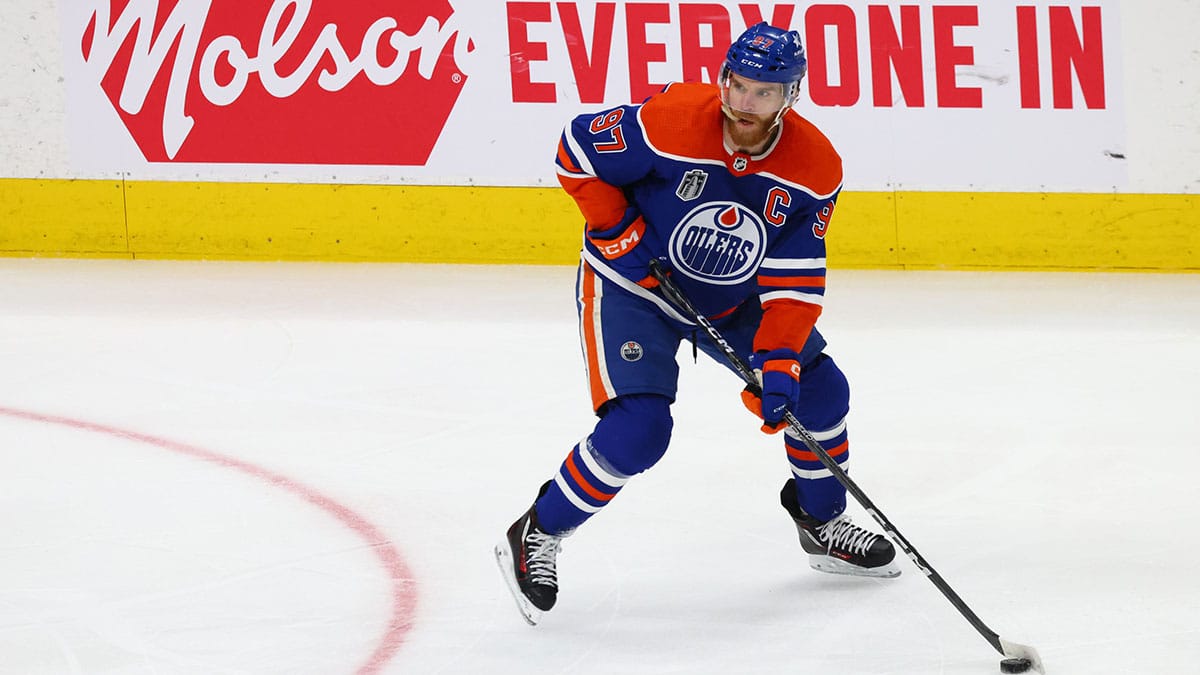 Edmonton Oilers center Connor McDavid (97) skates with the puck in the first period against the Florida Panthers in game four of the 2024 Stanley Cup Final at Rogers Place.