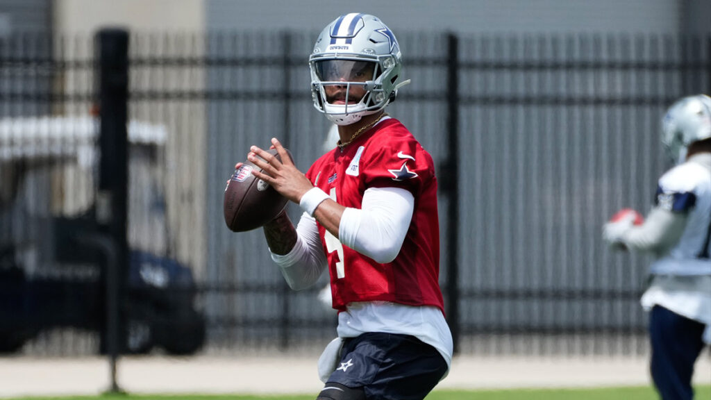 Dallas Cowboys quarterback Dak Prescott (4) goes through a drill during practice at the Ford Center at the Star Training Facility in Frisco, Texas. 