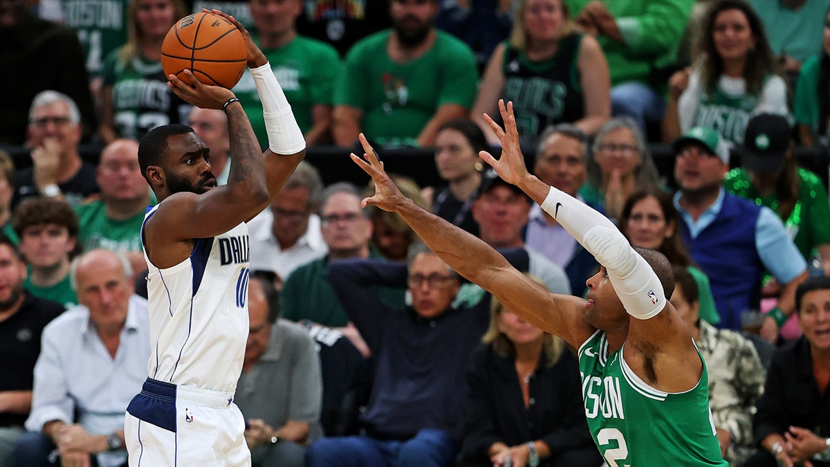 Jun 17, 2024; Boston, Massachusetts, USA; Dallas Mavericks forward Tim Hardaway Jr. (10) shoots the ball against Boston Celtics center Al Horford (42) in game five of the 2024 NBA Finals at TD Garden. Mandatory Credit: Peter Casey-USA TODAY Sports