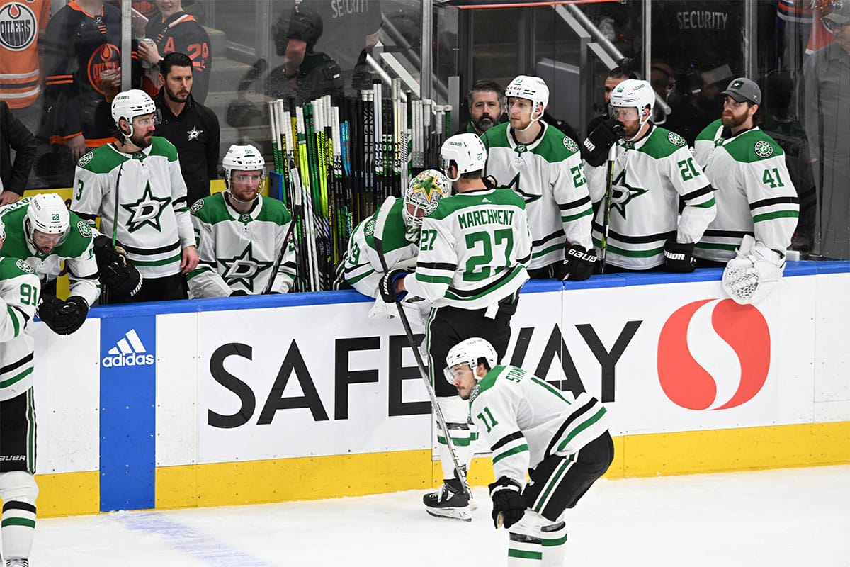 Dallas Stars players are seen on the players bench during the third period in game six of the Western Conference Final of the 2024 Stanley Cup Playoffs at Rogers Place.