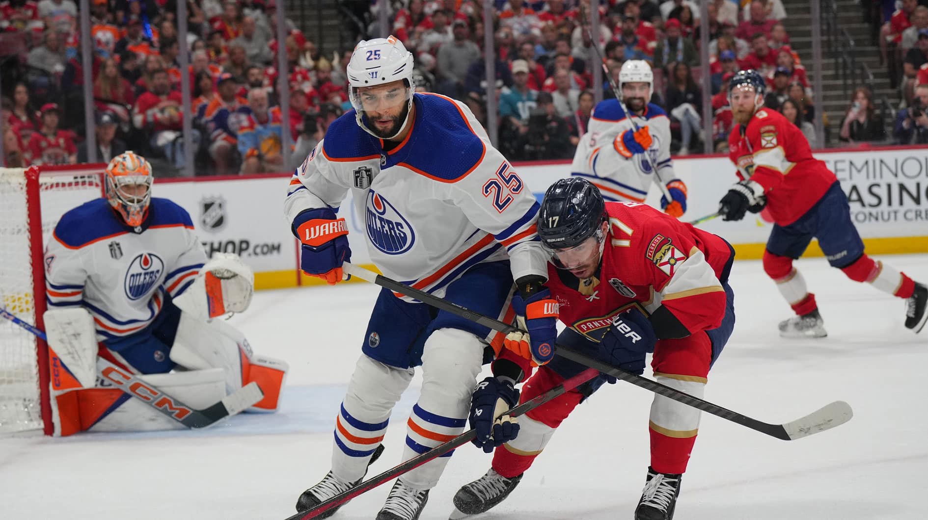 Edmonton Oilers defenseman Darnell Nurse (25) defends against Florida Panthers forward Evan Rodrigues (17) during the second period in game one of the 2024 Stanley Cup Final at Amerant Bank Arena.
