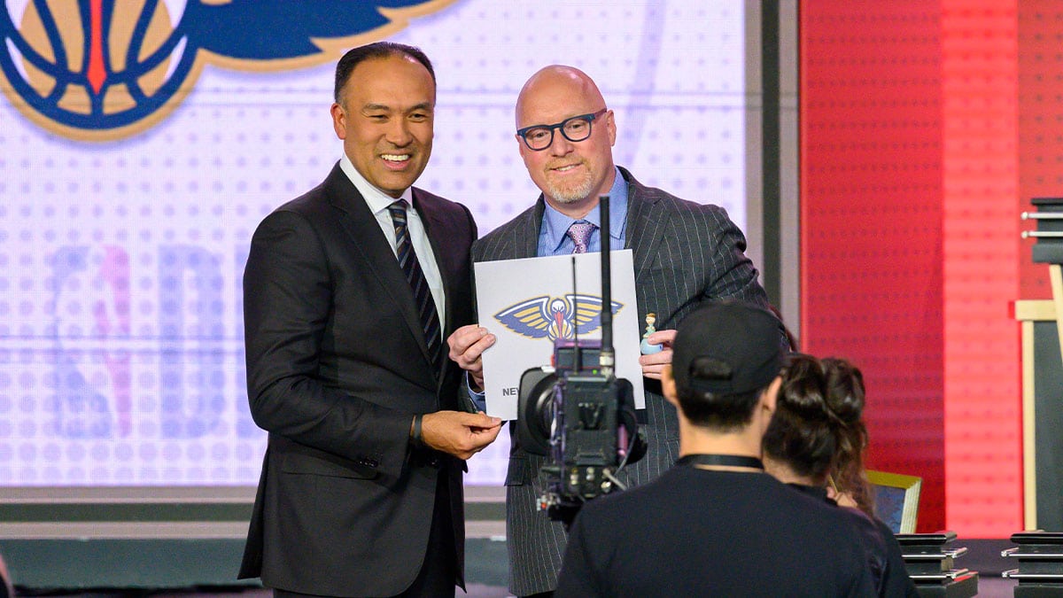 NBA deputy commissioner Mark Tatum (left) poses for a photo with New Orleans Pelicans executive vice president of basketball operations David Griffin after revealing the number one pick during the 2019 NBA Draft Lottery at the Hilton Chicago.