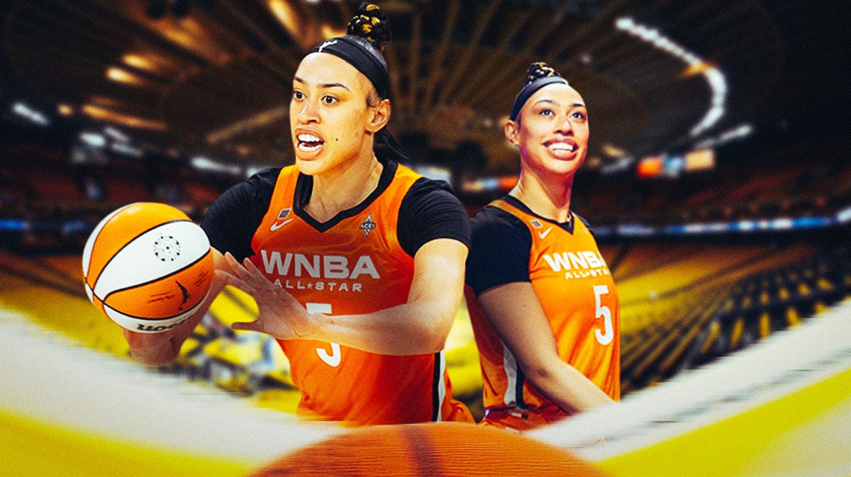 Dearica Hamby in a WNBA All-Star jersey with the LA Sparks arena in the background