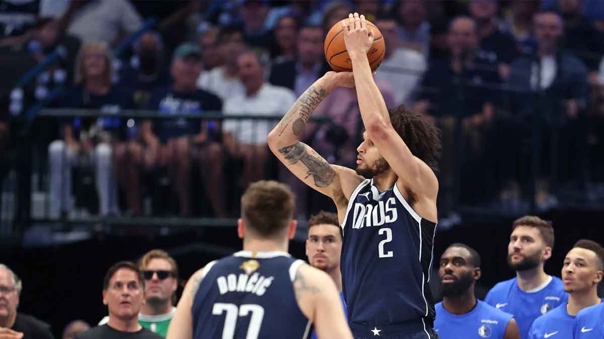Dallas Mavericks center Dereck Lively II (2) shoots the ball against the Boston Celtics during the first quarter during game four of the 2024 NBA Finals at American Airlines Center. 