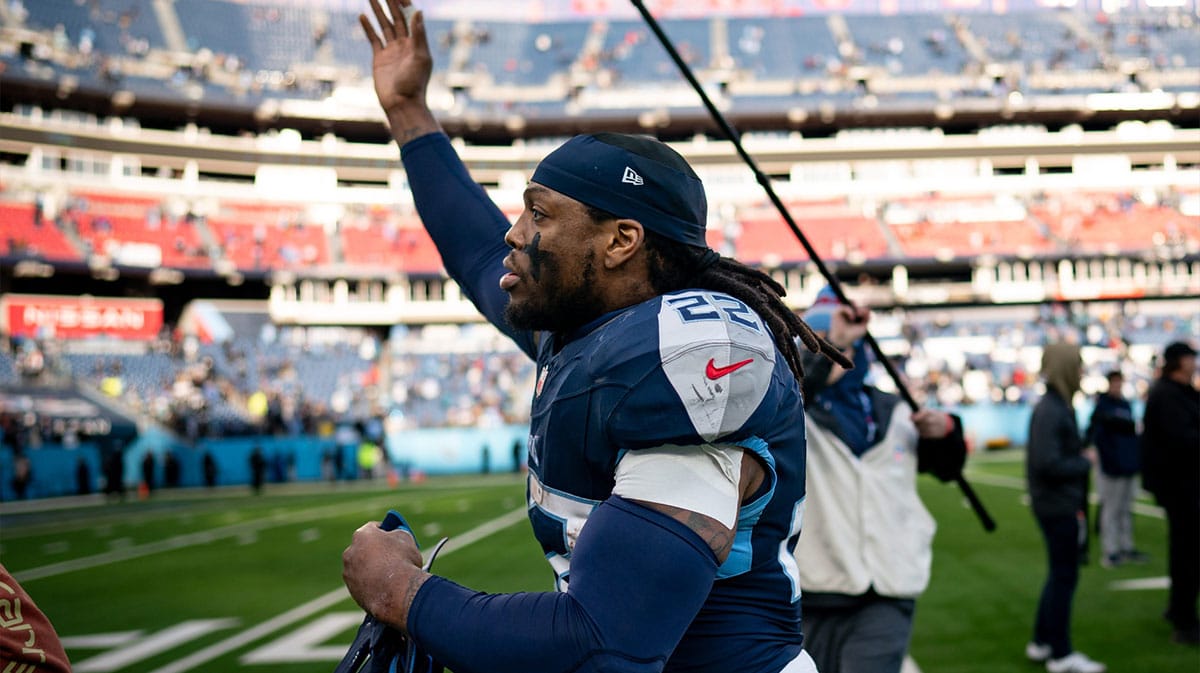 Tennessee Titans running back Derrick Henry (22) waves to fans as he exits the field after defeating Jacksonville Jaguars 28-20 at Nissan Stadium in Nashville, Tenn., Sunday, Jan. 7, 2024.