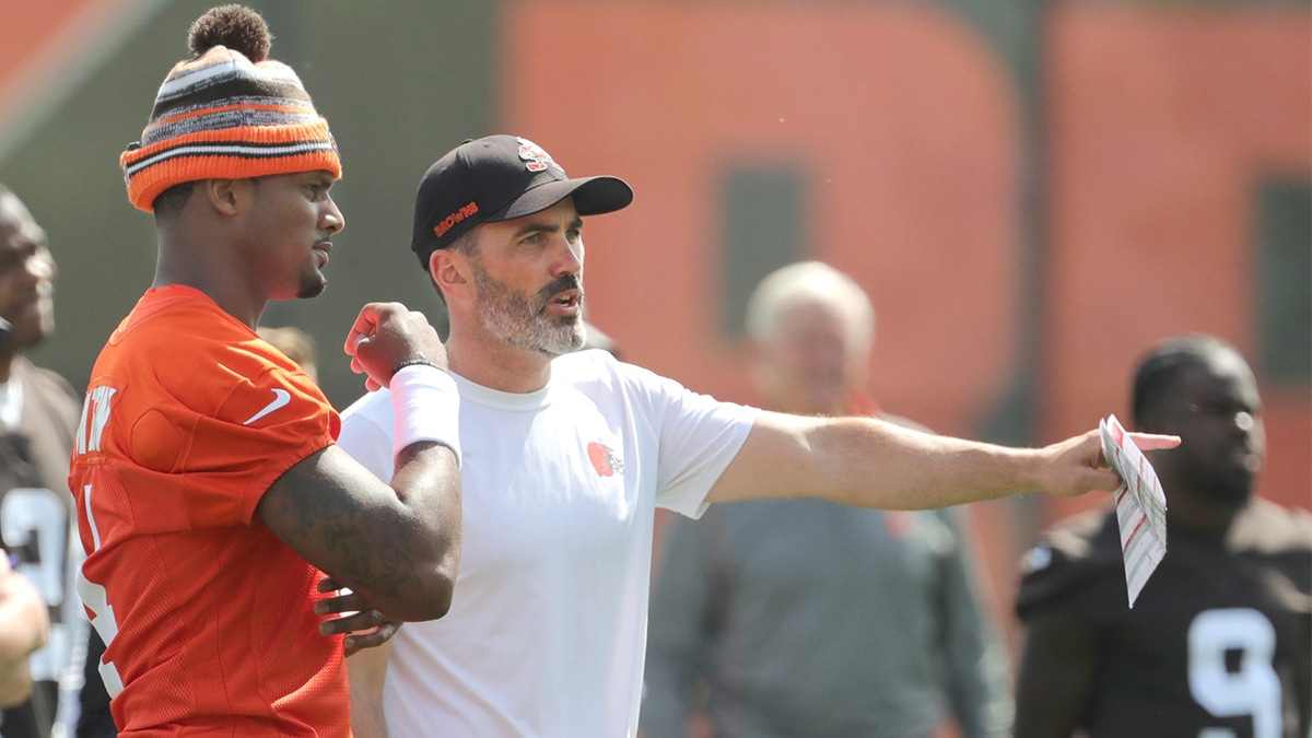 Browns quarterback Deshaun Watson talks with head coach Kevin Stefanski during a workout, Wednesday, June 8, 2022 in Berea.