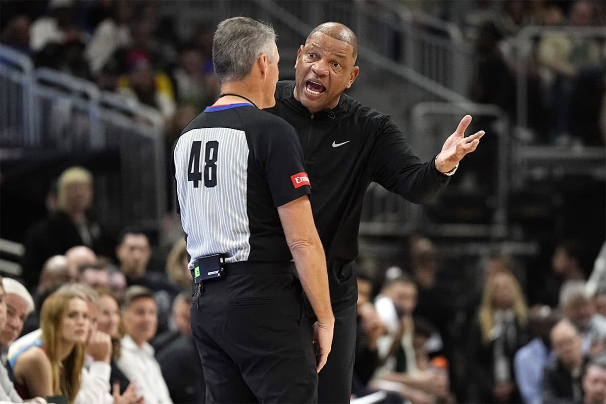 Milwaukee Bucks head coach Doc Rivers talks with referee Scott Foster (48) during the third quarter against the Indiana Pacers during game five of the first round for the 2024 NBA playoffs at Fiserv Forum.