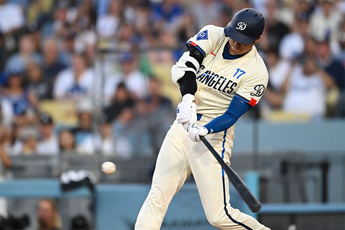 Los Angeles Dodgers designated hitter Shohei Ohtani (17) hits a home run against the Los Angeles Angels during the third inning at Dodger Stadium. 