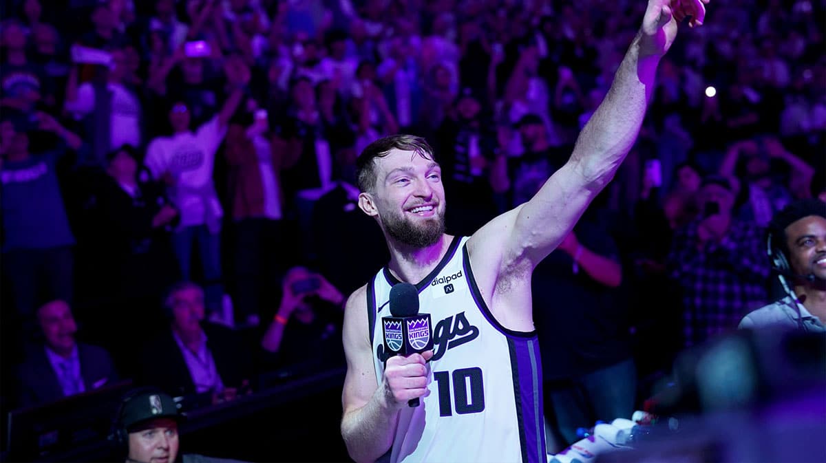 Sacramento Kings forward Domantas Sabonis (10) celebrates after the Kings defeated the Golden State Warriors during a play-in game of the 2024 NBA playoffs at the Golden 1 Center.