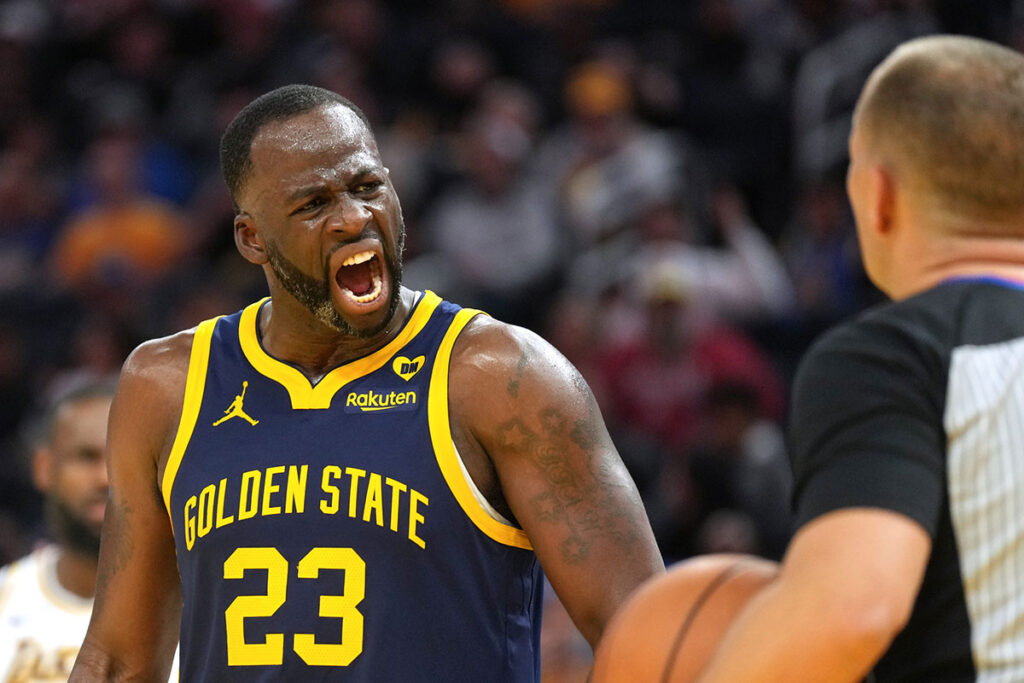 Golden State Warriors forward Draymond Green (23) yells at referee John Goble (right) during the fourth quarter against the Los Angeles Lakers at Chase Center. 