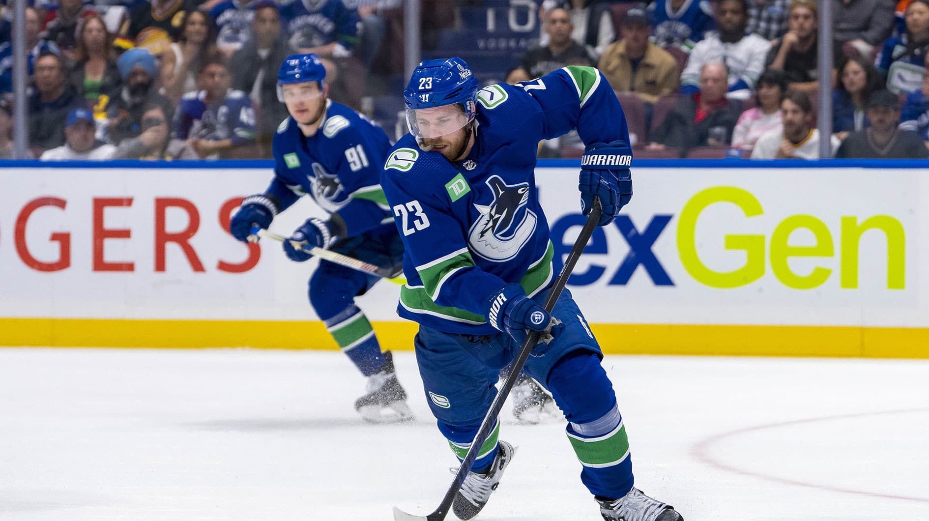 Vancouver Canucks forward Elias Lindholm (23) handles the puck against the Edmonton Oilers during the first period in game seven of the second round of the 2024 Stanley Cup Playoffs at Rogers Arena.