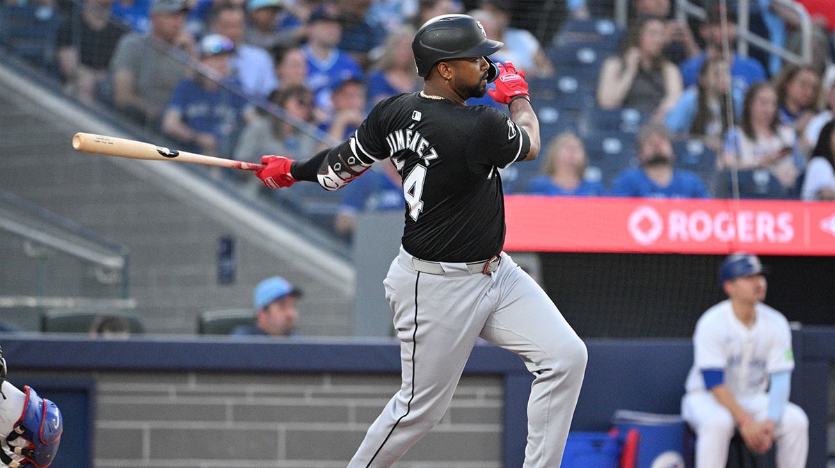 Chicago White Sox designated hitter Eloy Jimenez (74) hits a double against the Toronto Blue Jays in the sixth inning at Rogers Centre. 