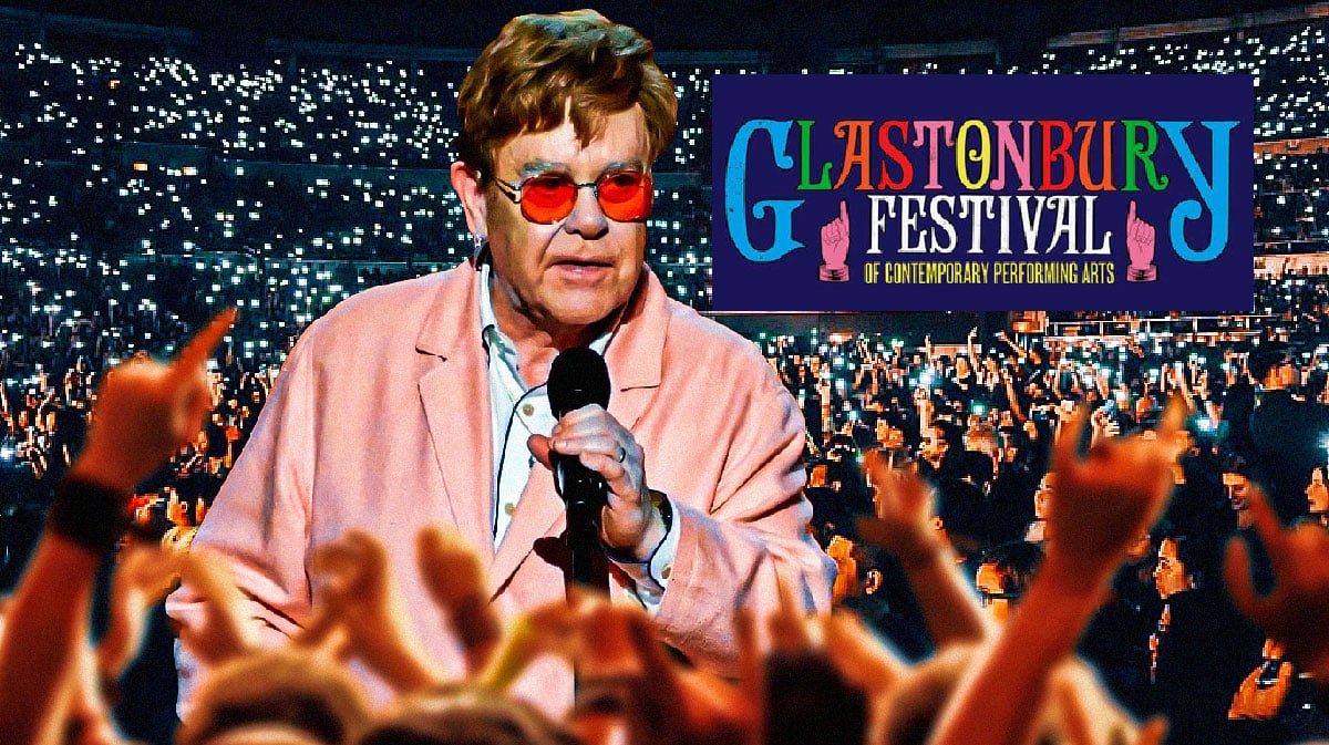 Elton John with Glastonbury logo and concert crowd background — final UK show on 'Farewell Yellow Brick Road' tour to be streamed on BBC iPlayer.