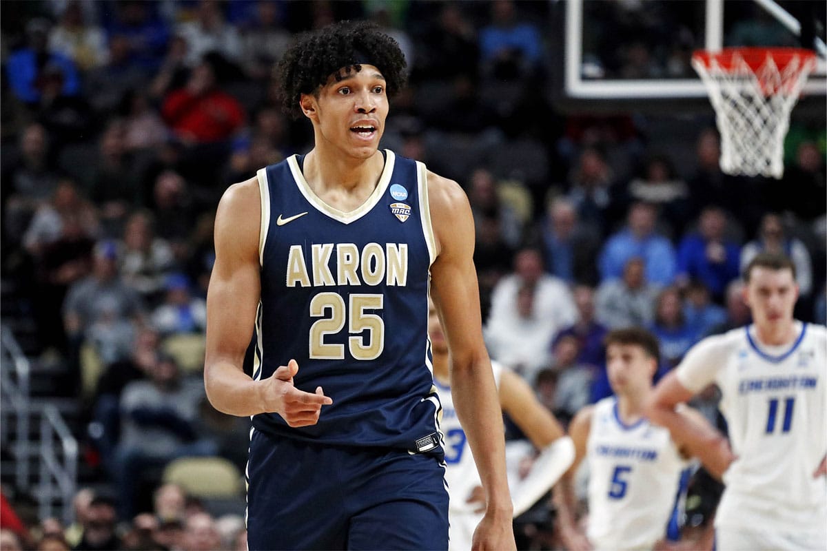 Akron Zips forward Enrique Freeman (25) reacts after a play during the first half of the game against the Creighton Bluejays in the first round of the 2024 NCAA Tournament at PPG Paints Arena. 