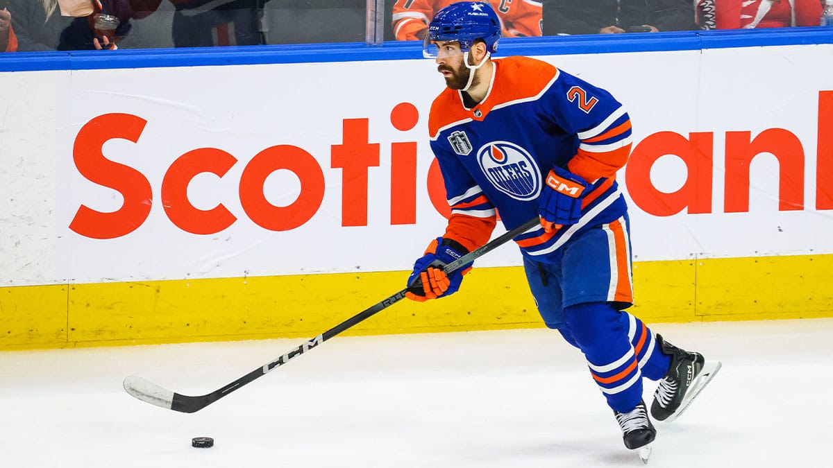 Edmonton Oilers defenseman Evan Bouchard (2) skates with the puck against the Florida Panthers during the third period in game four of the 2024 Stanley Cup Final at Rogers Place.