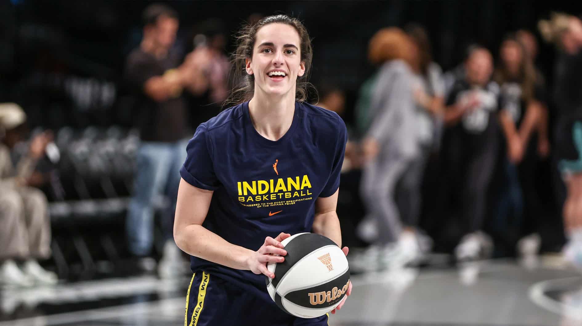 Fever guard Caitlin Clark (22) warms up prior to the game