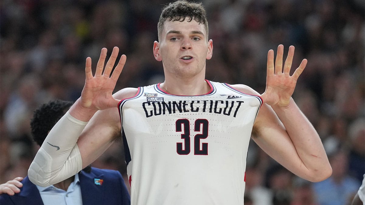 Connecticut Huskies center Donovan Clingan (32) celebrates defeating the Purdue Boilermakers in the national championship game of the Final Four of the 2024 NCAA Tournament at State Farm Stadium
