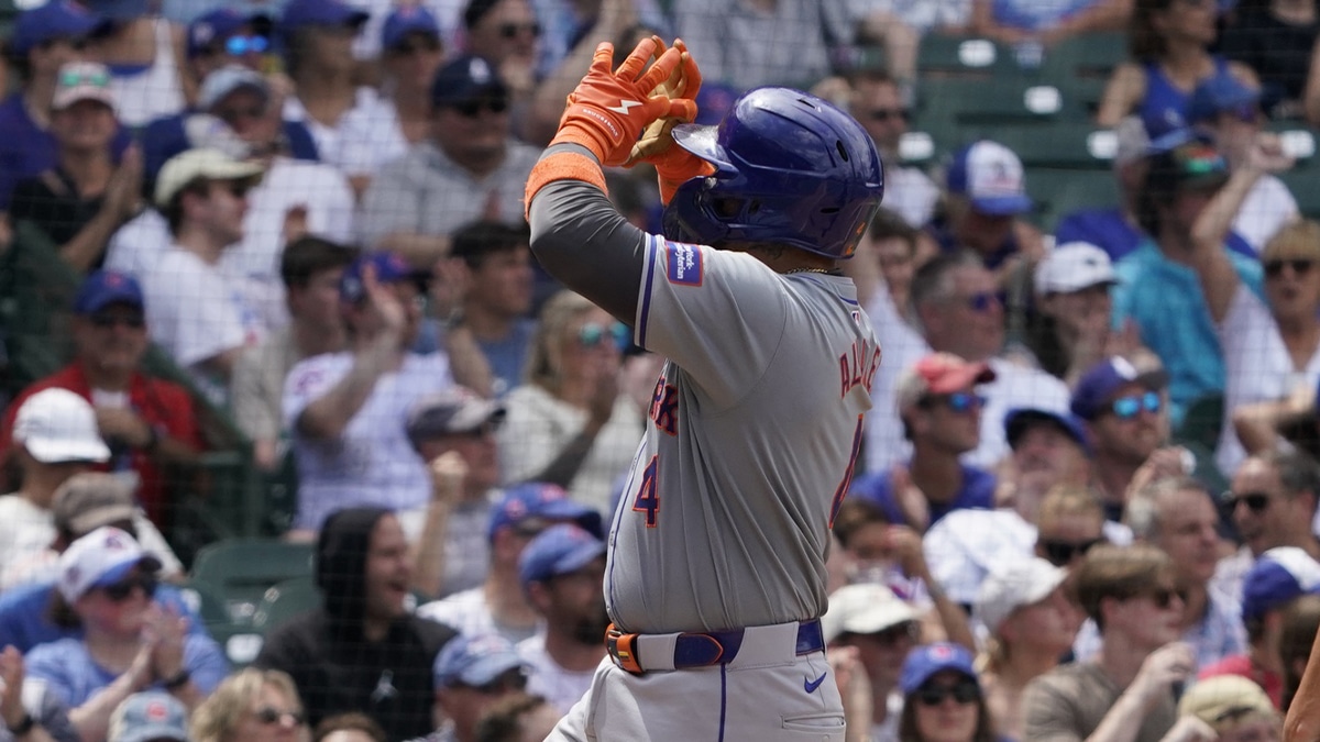 New York Mets catcher Francisco Alvarez (4) gestures after hitting a home run against the Chicago Cubs during the fifth inning at Wrigley Field.