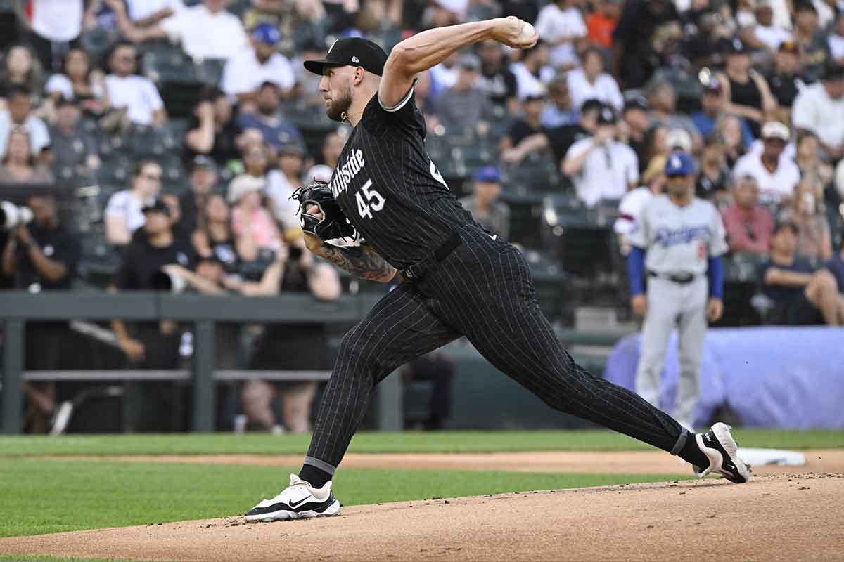 Jun 24, 2024; Chicago, Illinois, USA; Chicago White Sox pitcher Garrett Crochet (45) delivers against the Los Angeles Dodgers during the first inning at Guaranteed Rate Field.
