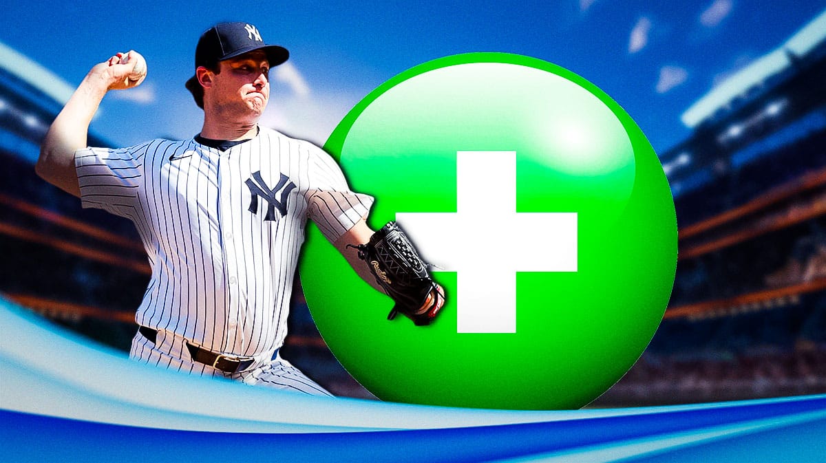 Gerrit Cole with green injury symbol. Yankee Stadium in background