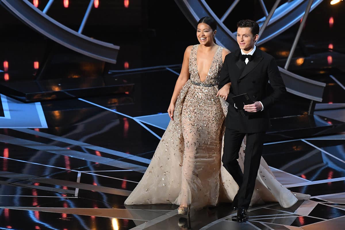 Gina Rodriguez and Spider-Man star Tom Holland presenting at the Oscars.