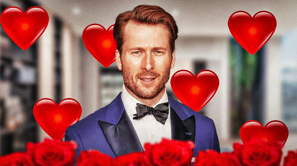 Glen Powell with hearts around him