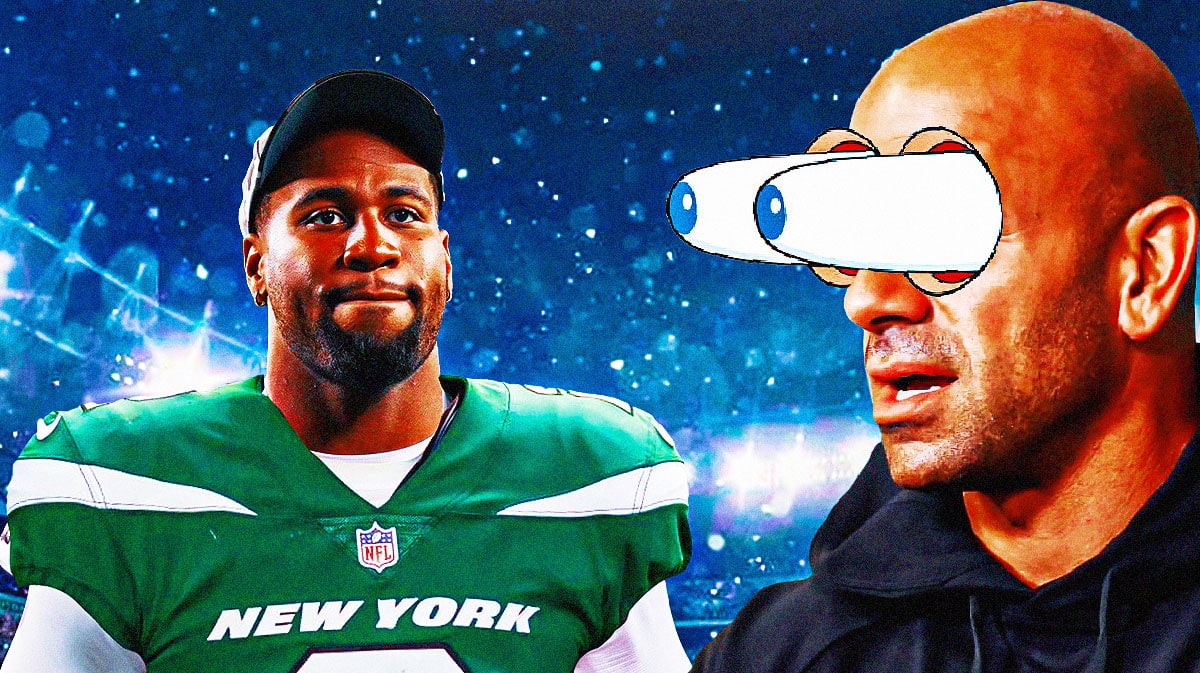 New York Jets coach Robert Saleh with his eyes popping out next to Haason Reddick in Jets jersey