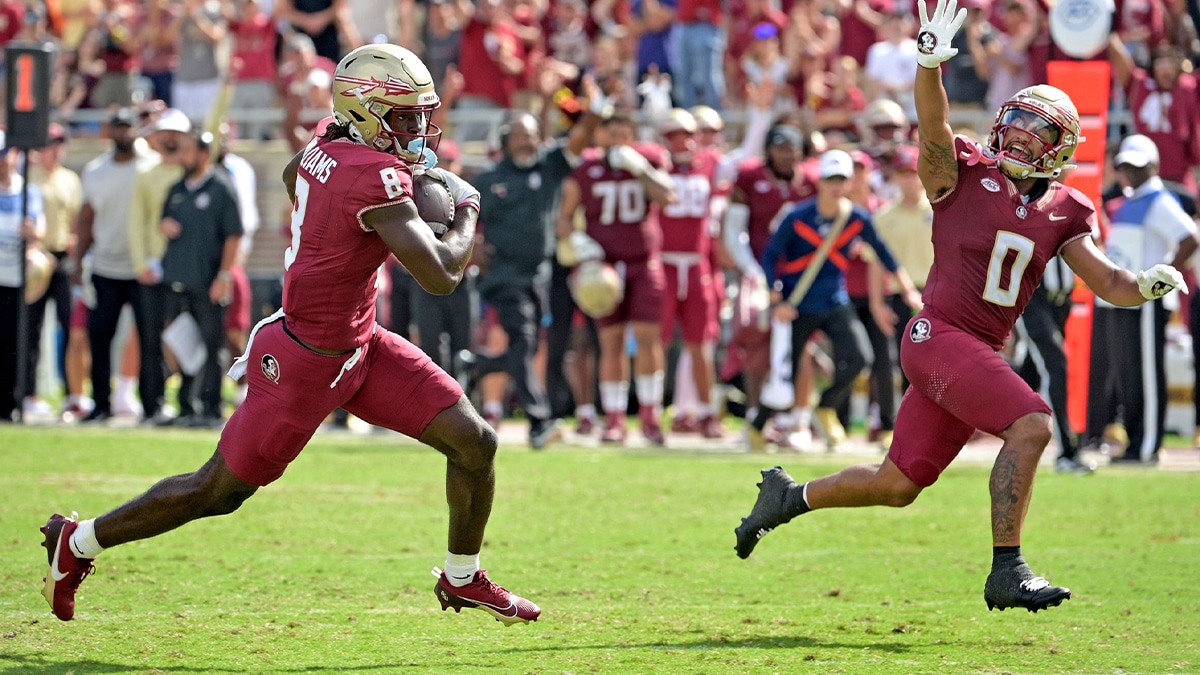 Oct 14, 2023; Tallahassee, Florida, USA; Florida State Seminoles wide receiver Hykeem Williams (8) scores a touchdown as wide receiver Ja'Khi Douglas (0) celebrates during the second half against the Syracuse Orange at Doak S. Campbell Stadium. Mandatory Credit: Melina Myers-USA TODAY Sports