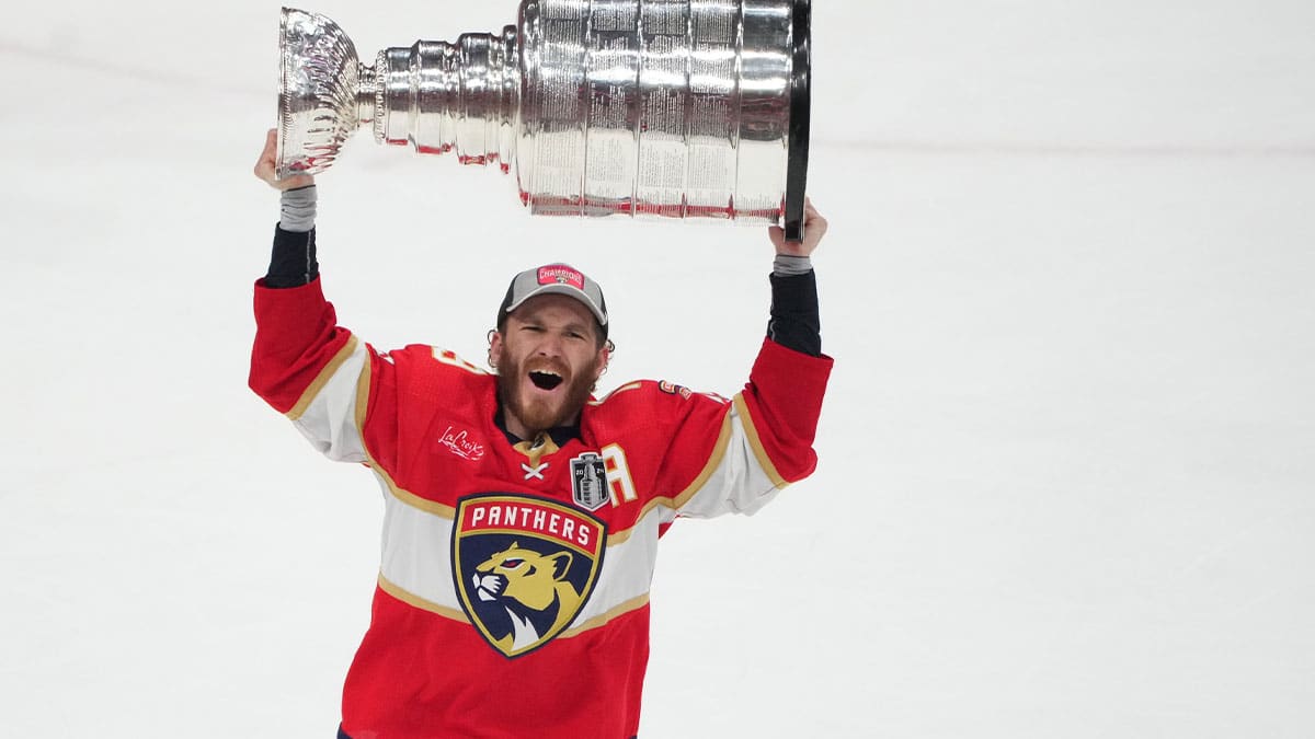  Florida Panthers forward Matthew Tkachuk (19) hoists the Stanley Cup after defeating Edmonton Oilers in game seven of the 2024 Stanley Cup Final at Amerant Bank Arena