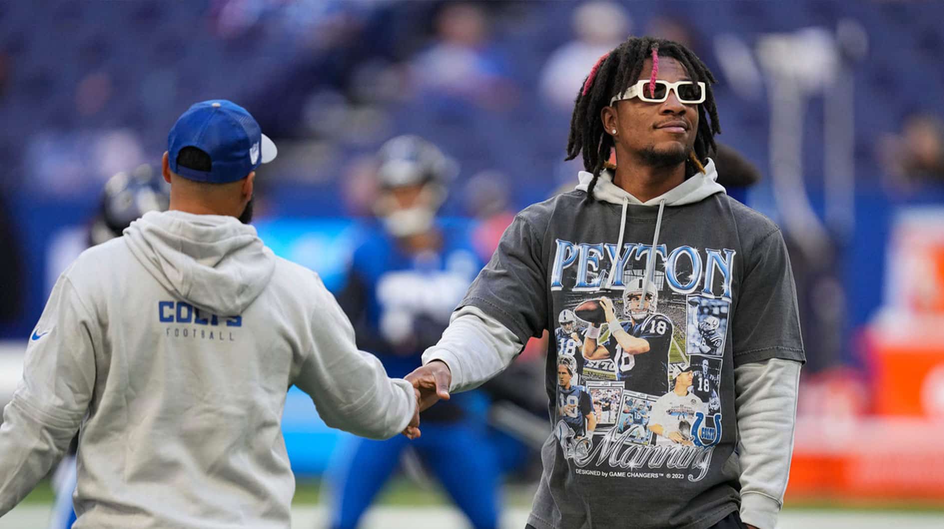 Indianapolis Colts quarterback Anthony Richardson (5), who is out for the season due to injury, walks the field before the team faces the Cleveland Browns on Sunday, Oct. 22, 2023, at Lucas Oil Stadium in Indianapolis