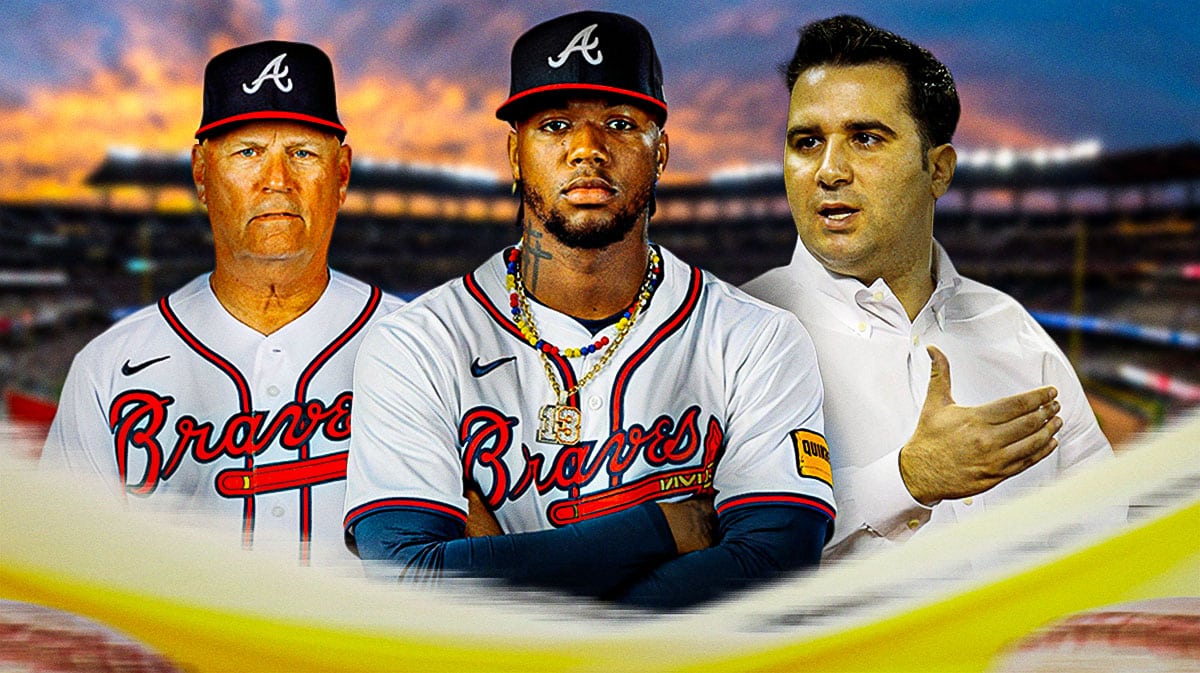 Ronald Acuna Jr. with Brian Snitker and Alex Anthopoulos in the background