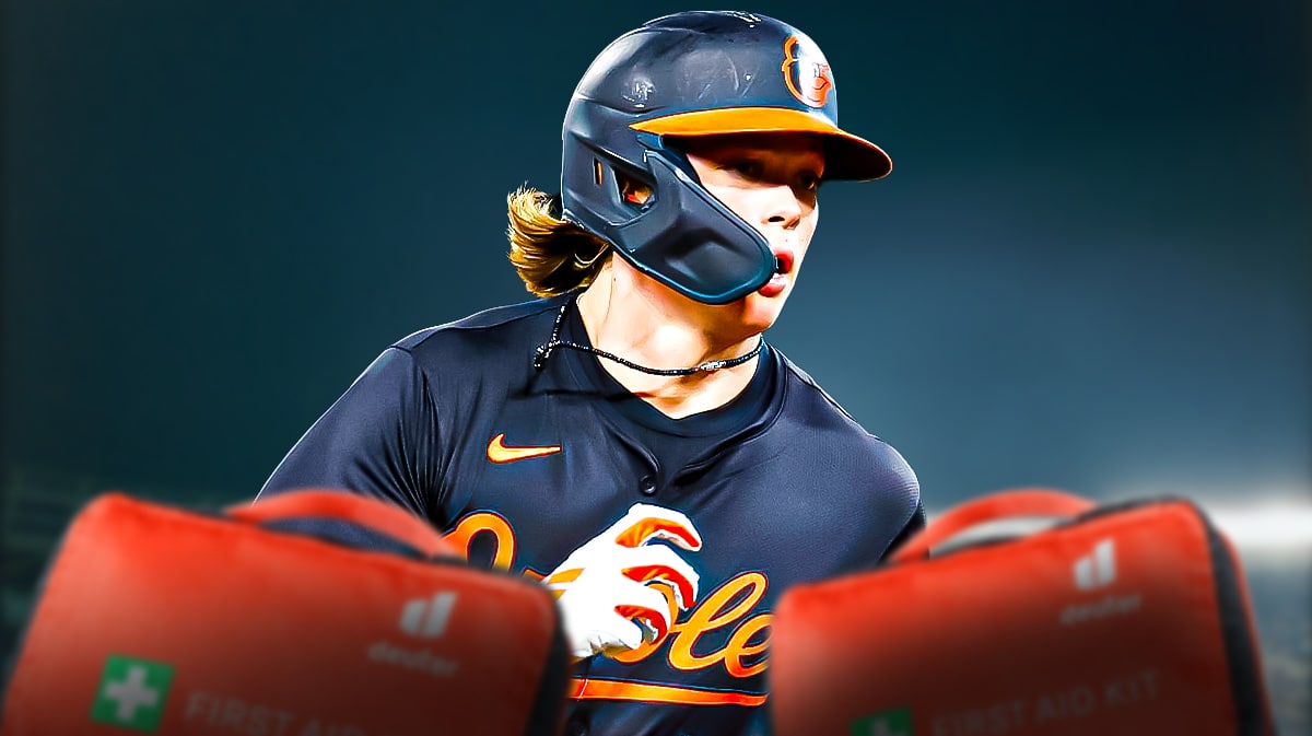Photo: Jackson Holliday in Orioles jersey looking serious with medical kits around him