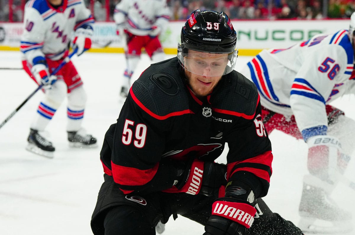 Carolina Hurricanes center Jake Guentzel (59) skates with the puck against the New York Rangers during the first period in game four of the second round of the 2024 Stanley Cup Playoffs at PNC Arena.