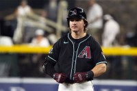 Arizona Diamondbacks outfielder Jake McCarthy (31) reacts after hitting a double against the San Francisco Giants in the ninth inning at Chase Field.