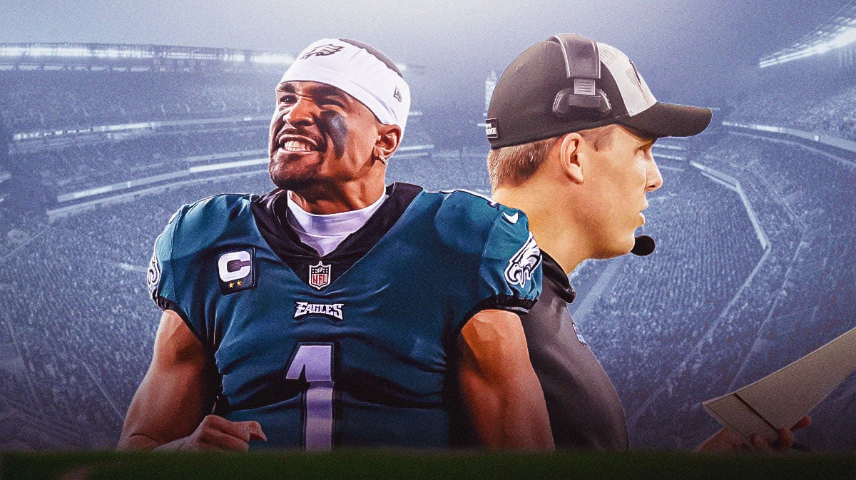Jalen Hurts and Kellen Moore with Lincoln Financial Field in background