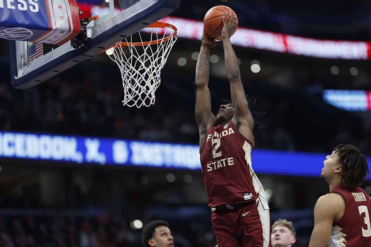 Florida State Seminoles forward Jamir Watkins (2) dunks the ball against the Virginia Tech Hokies in the second half at Capital One Arena.