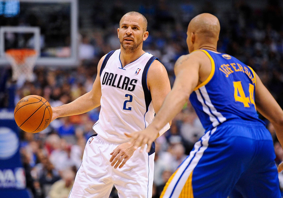 Dallas Mavericks point guard Jason Kidd (2) looks to set the play as Golden State Warriors small forward Richard Jefferson (44) defends during the game at the American Airlines Center. The Mavericks defeated the Warriors 104-94.