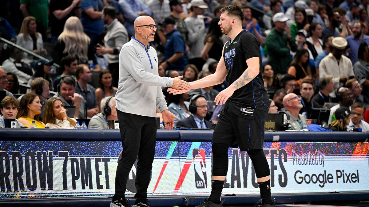 Dallas Mavericks head coach Jason Kidd greets guard Luka Doncic (77) as Doncic comes off the floor during the third quarter against the LA Clippers during game six of the first round for the 2024 NBA playoffs at American Airlines Center.