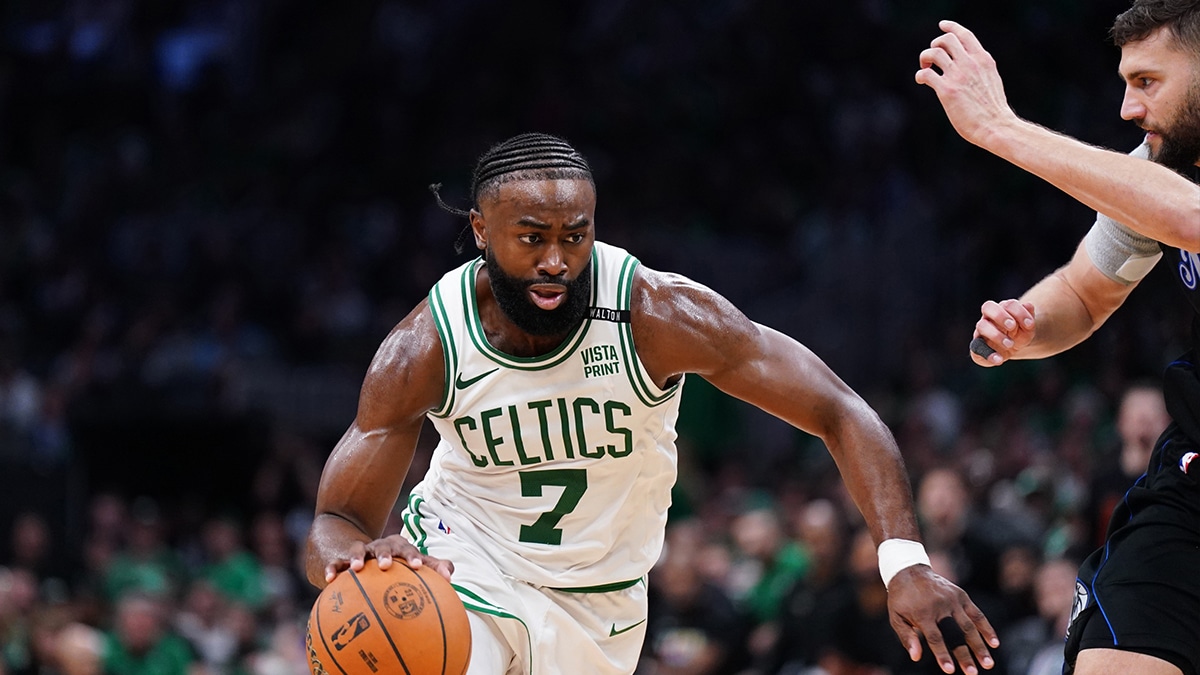 Boston Celtics guard Jaylen Brown (7) controls the ball against Dallas Mavericks forward Maxi Kleber (42) in the third quarter during game one of the 2024 NBA Finals at TD Garden.