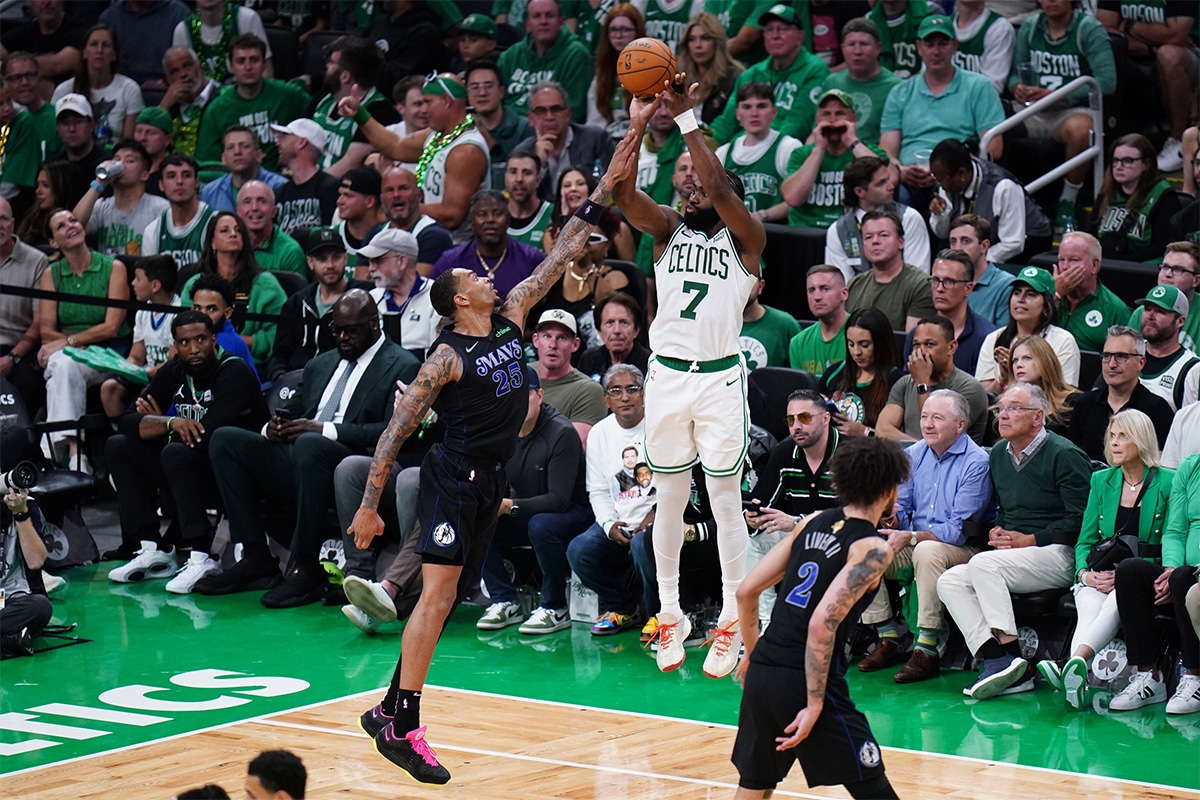 Boston Celtics guard Jaylen Brown (7) shoots against Dallas Mavericks forward P.J. Washington (25) in the fourth quarter during game one of the 2024 NBA Finals at TD Garden. 
