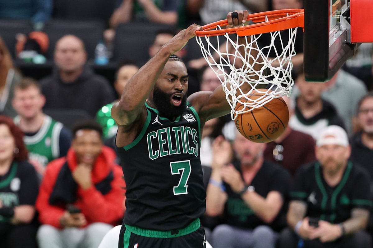 Boston Celtics guard Jaylen Brown (7) dunks against the Dallas Mavericks during the second quarter in game two of the 2024 NBA Finals at TD Garden. 