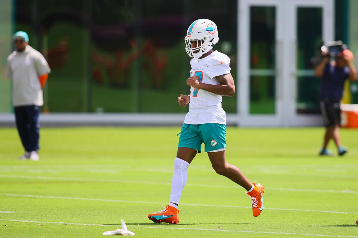 Miami Dolphins wide receiver Jaylen Waddle (17) runs on the field during mandatory minicamp at Baptist Health Training Complex. 
