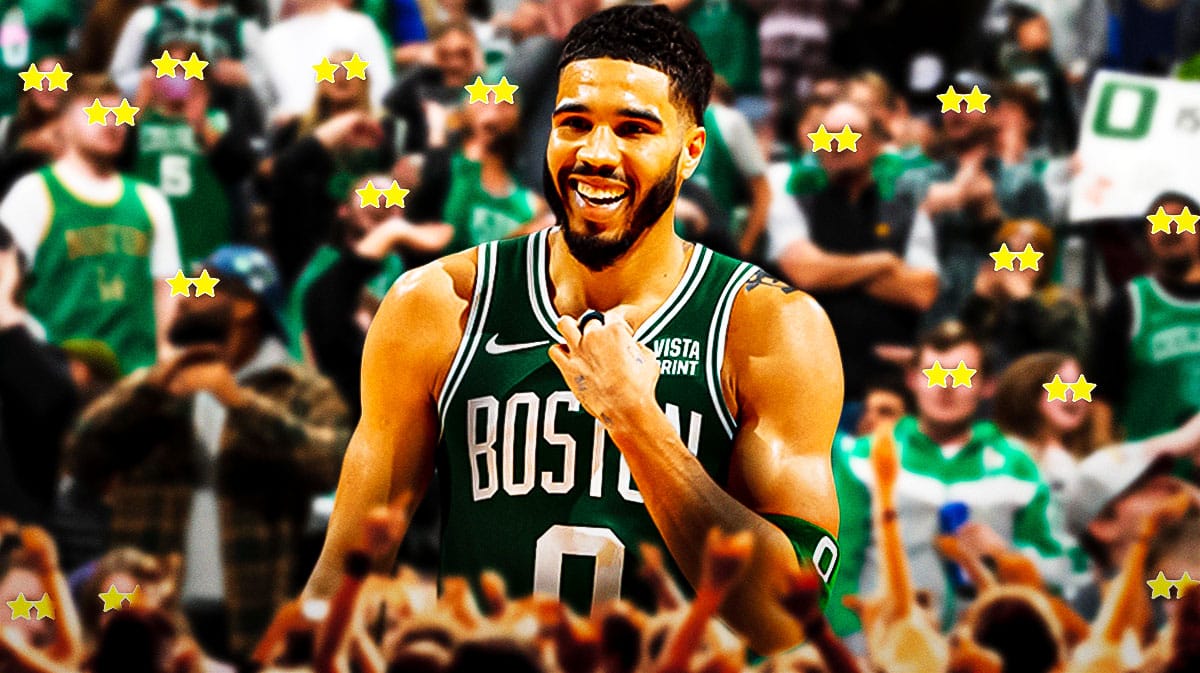 Jayson Tatum with a bunch of Boston Celtics fans with stars in their eyes around him