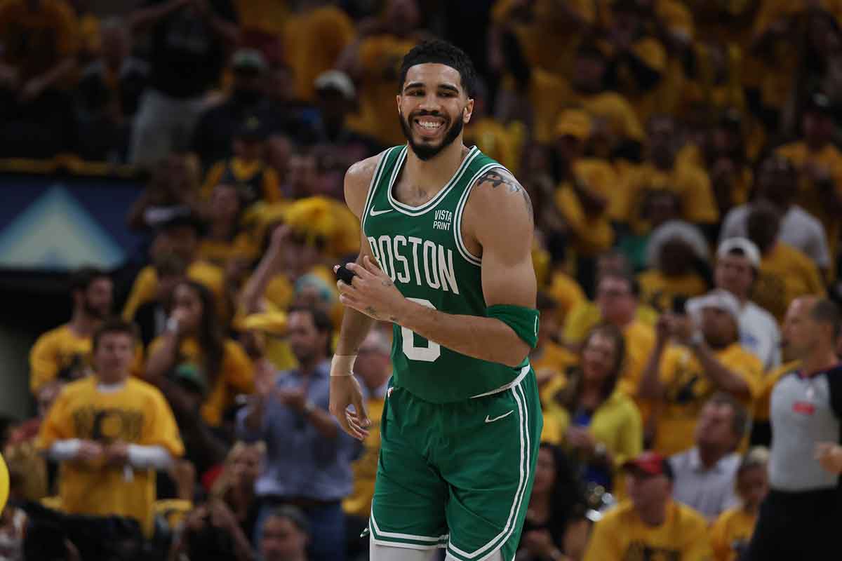 Boston Celtics forward Jayson Tatum (0) reacts after a basket against the Indiana Pacers during the second quarter of game three of the eastern conference finals in the 2024 NBA playoffs at Gainbridge Fieldhouse.