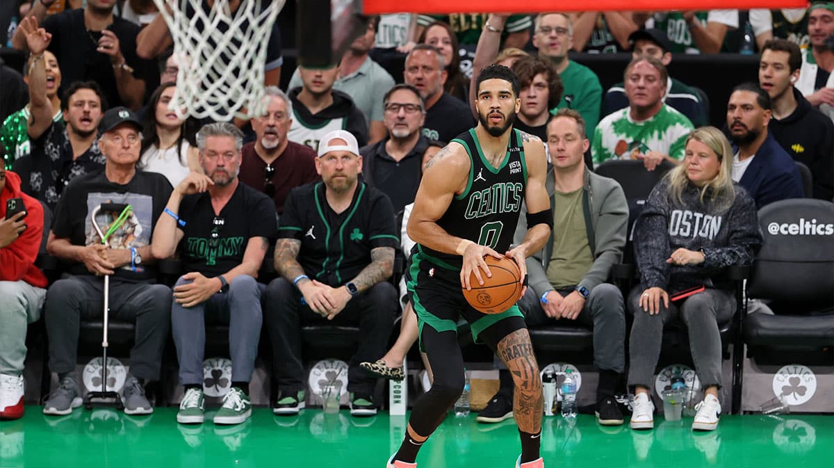 Boston Celtics forward Jayson Tatum (0) shoots the ball against the Dallas Mavericks during the second quarter in game two of the 2024 NBA Finals at TD Garden.