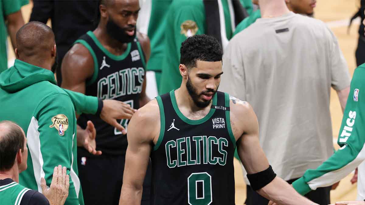 Boston Celtics forward Jayson Tatum (0) walks to the bench during the fourth quarter in game two of the 2024 NBA Finals at TD Garden.